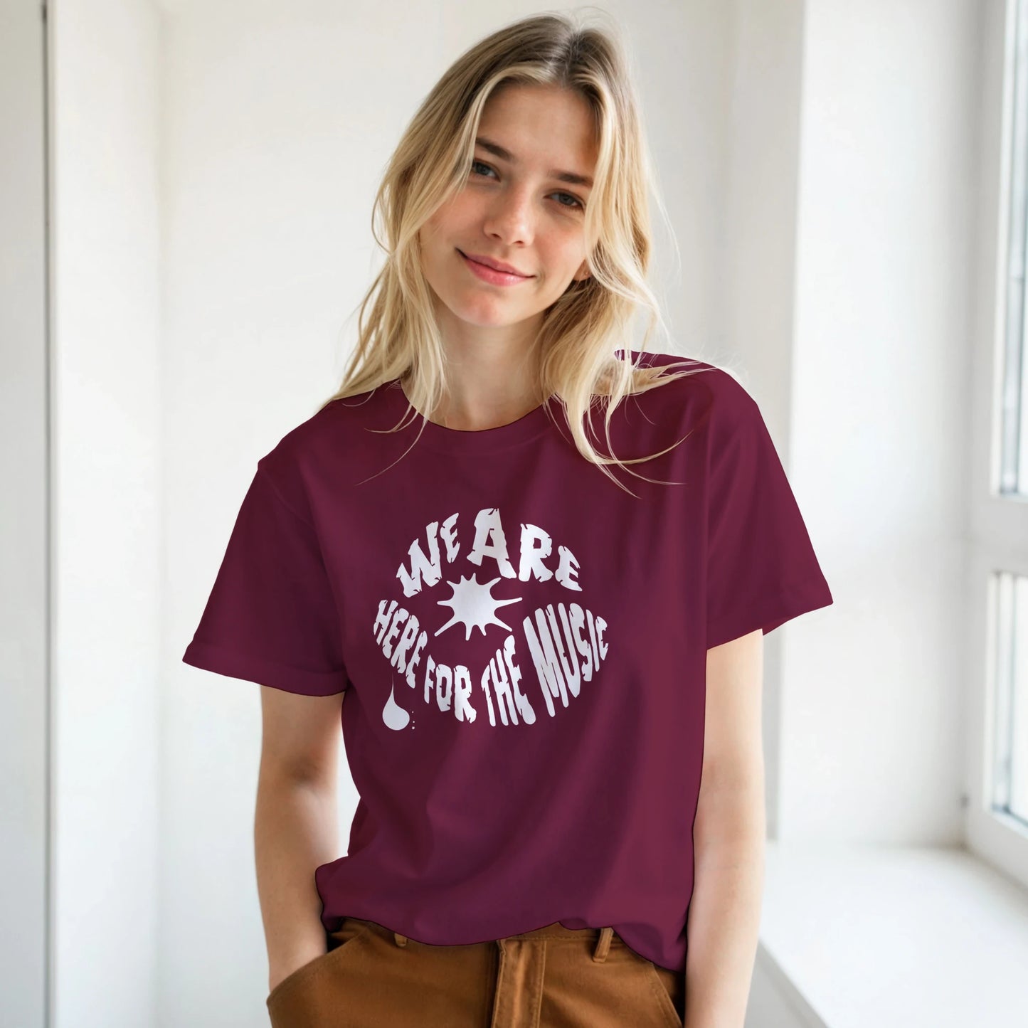 Unisex T‑shirt with ‘We Are Here For The Music’ bold text graphic